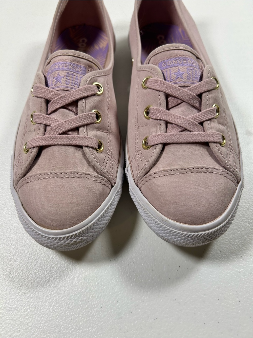 Converse Women’s Low Top Slip-On Sneakers in Blush Pink with Gold Eyelets